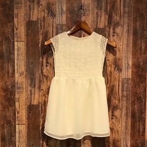Girl’s pale yellow dress